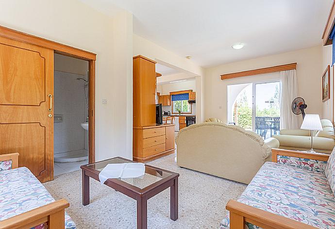 Open-plan living room with dining area, kitchen, WiFi Internet, TV and DVD player, and terrace access . - Villa Aristotelis . (Photo Gallery) }}
