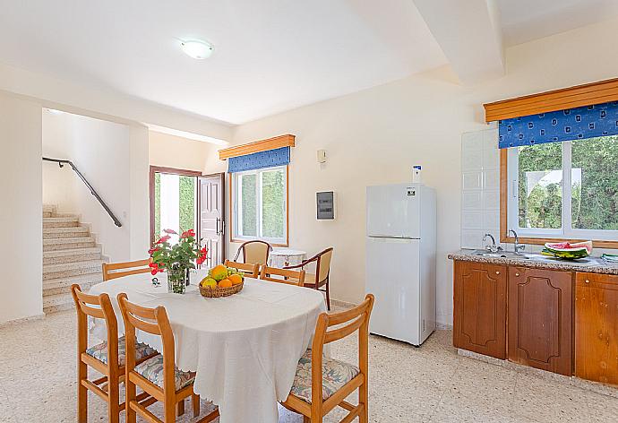 Open-plan living room with dining area, equipped kitchen, WiFi Internet, TV and DVD player, and terrace access . - Villa Aristotelis . (Photo Gallery) }}