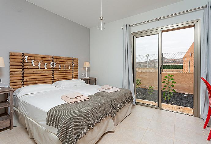 Twin bedroom with terrace access . - Villa Domingo . (Photo Gallery) }}