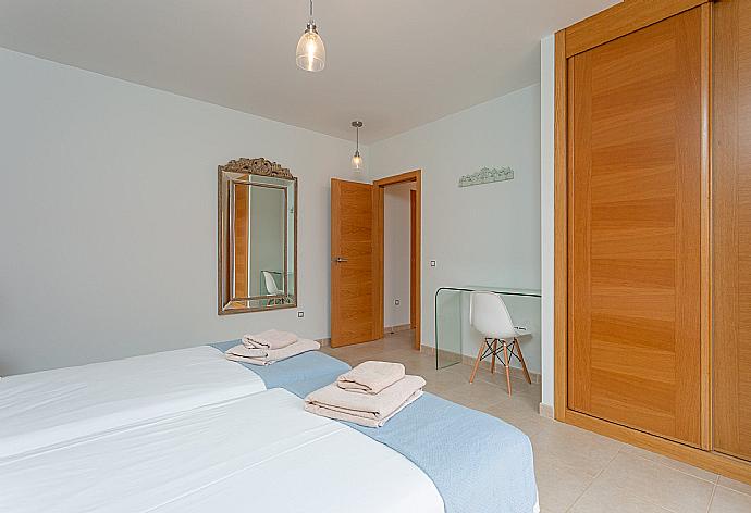 Twin bedroom with terrace access . - Villa Barquetta . (Photo Gallery) }}