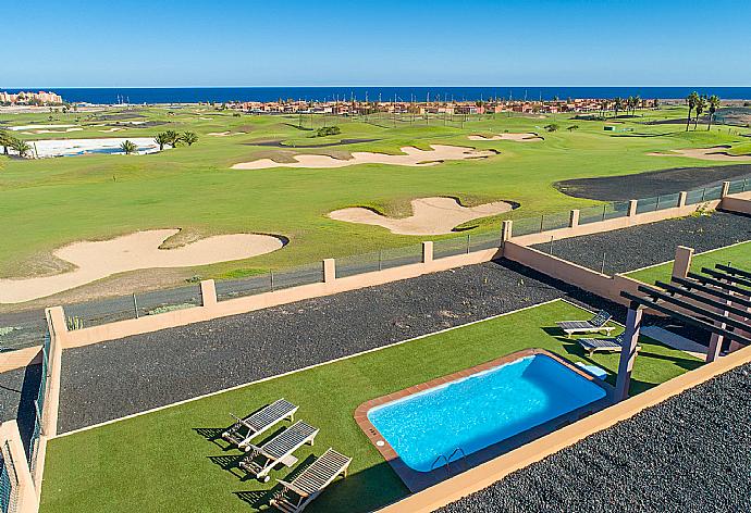 Aerial view of pool terrace with sea views . - Villa Almar . (Galleria fotografica) }}