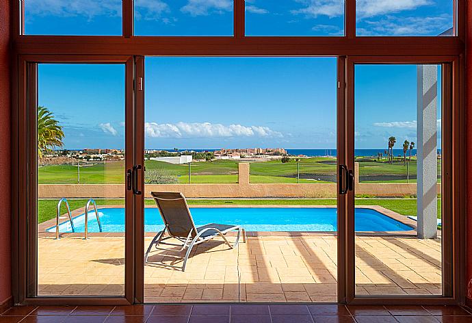 View of pool and terrace from atrium . - Villa Marisol . (Photo Gallery) }}