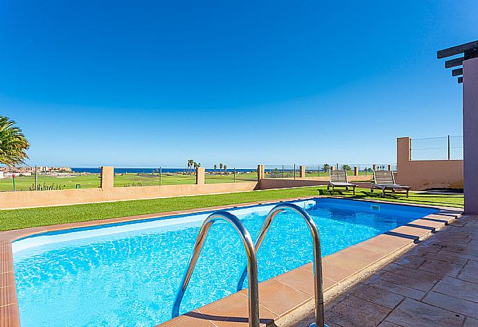 Terrace area with sea views . - Villa Tamarindos . (Photo Gallery) }}