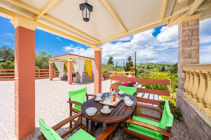 Sheltered terrace area . - Villa Psaropouli . (Photo Gallery) }}