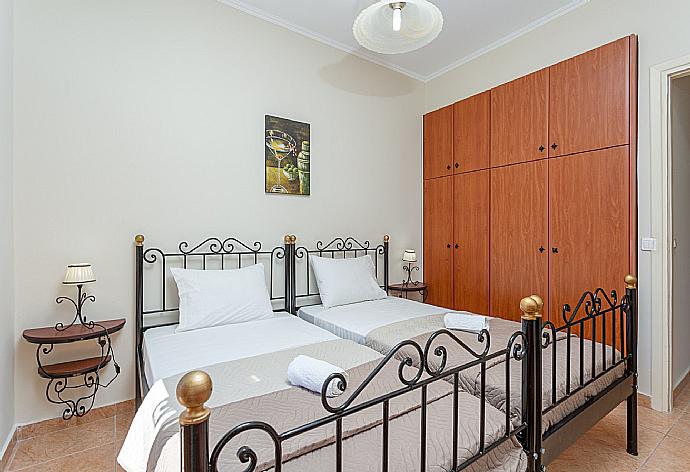 Twin bedroom with A/C, satellite TV, and terrace access . - Villa Mansion . (Photo Gallery) }}