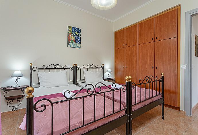 Twin bedroom with A/C, TV, and terrace access . - Villa Bora . (Photo Gallery) }}
