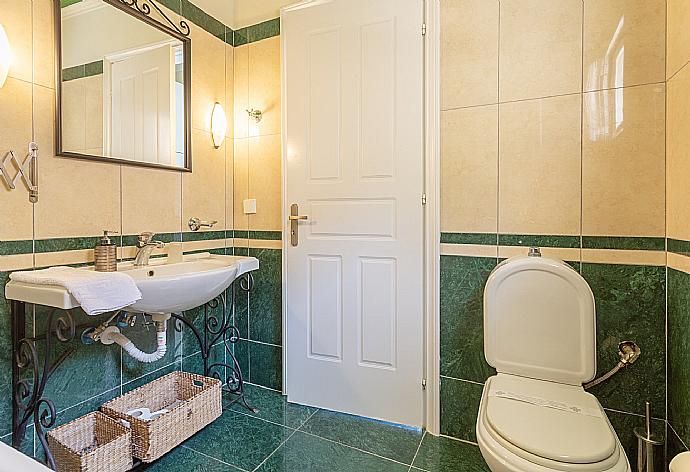 En suite bathroom with bath and shower . - Villa Votsalo . (Photo Gallery) }}