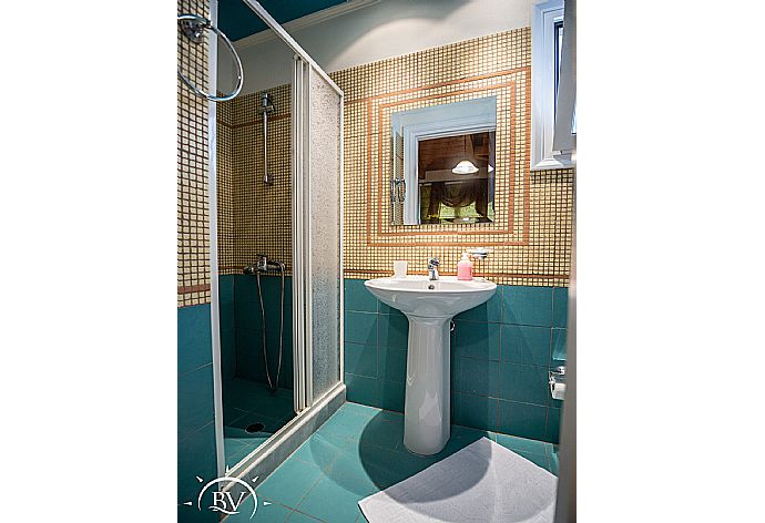 En suite bathroom with shower  . - Villa Flisvos . (Photo Gallery) }}