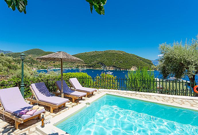 Private pool and terrace with panoramic sea views . - Villa Flisvos . (Photo Gallery) }}