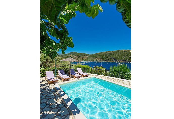 Private pool and terrace with panoramic sea views . - Villa Flisvos . (Photo Gallery) }}