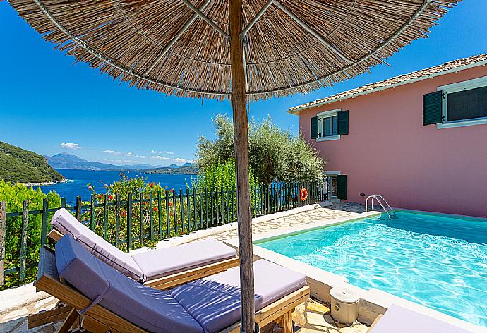 Private pool and terrace with panoramic sea views . - Villa Flisvos . (Photo Gallery) }}