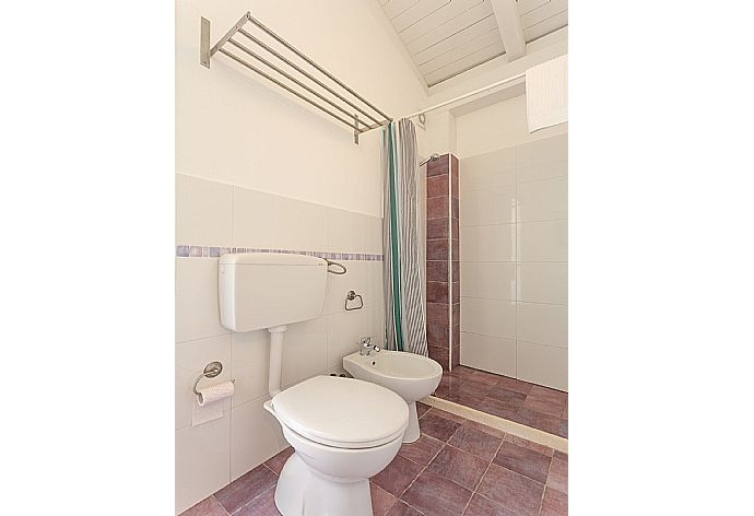 En suite bathroom with shower . - Villino Malva . (Photo Gallery) }}