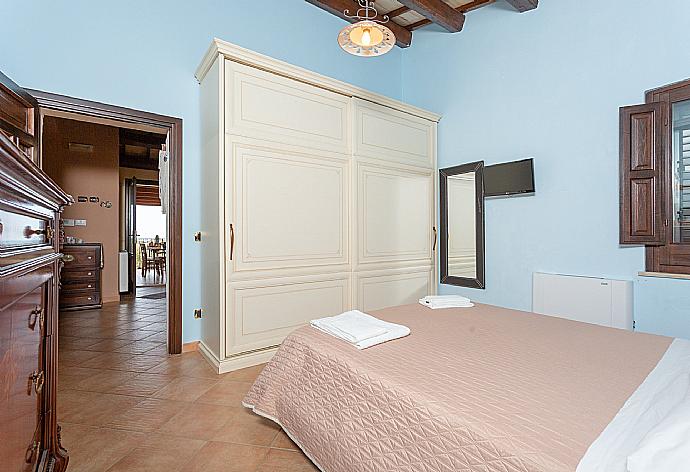 Double bedroom on first floor of main building with A/C . - Villa Aziz . (Photo Gallery) }}