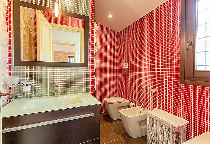 Family bathroom on ground floor of main building with shower . - Villa Aziz . (Photo Gallery) }}