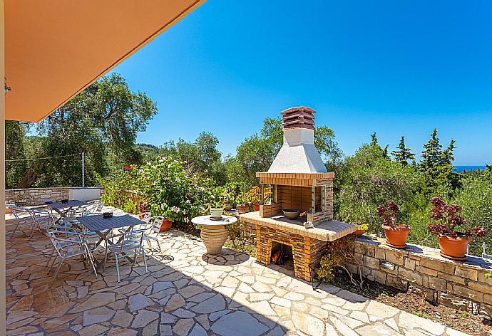 Terrace area with BBQ . - Villa Stephania . (Photo Gallery) }}