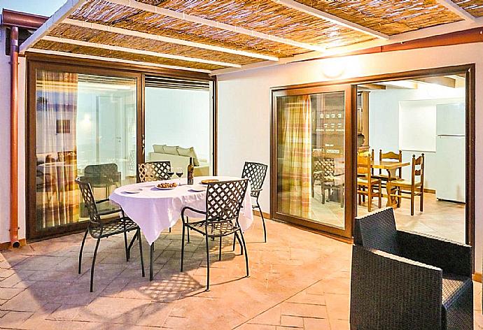Outdoor dining area  . - Dune Giardino . (Photo Gallery) }}