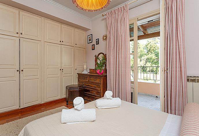 Double bedroom with A/C and balcony access . - Villa Durrell . (Photo Gallery) }}