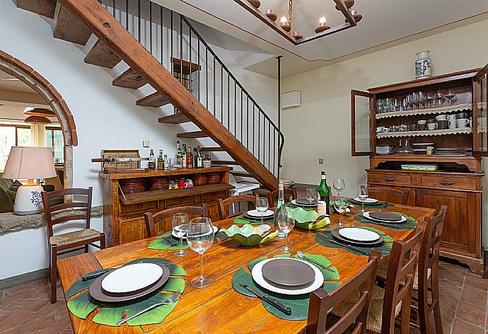 Dining room on ground floor of main building with ornamental fireplace . - Villa Casale Silvia . (Galleria fotografica) }}