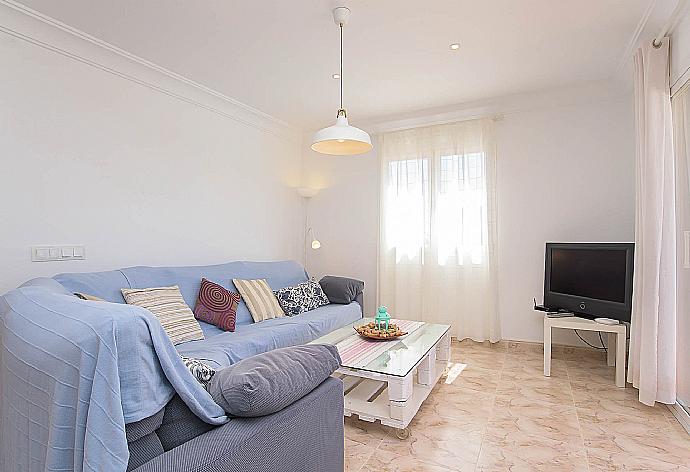 Living room with sofas, and TV . - Villa Alicia . (Galería de imágenes) }}