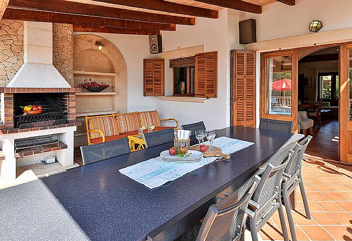 Sheltered terrace area with BBQ . - Villa Marta . (Photo Gallery) }}