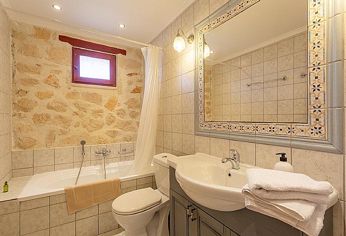 Family bathroom with bath and shower . - Villa Zozel . (Photo Gallery) }}