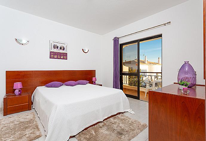 Double bedroom with balcony access . - Villa Lumiere . (Photo Gallery) }}