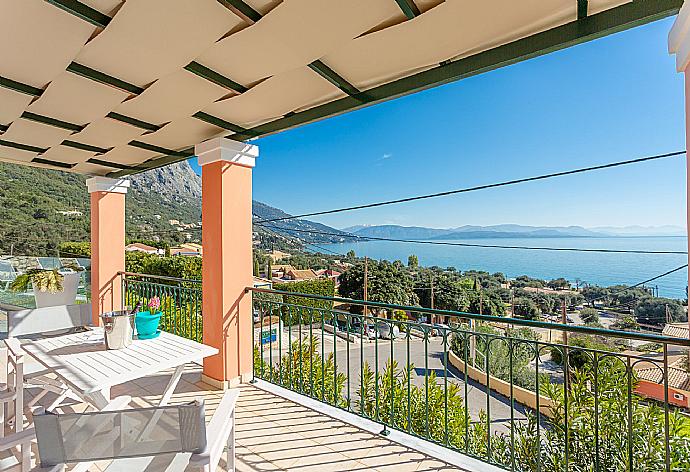 Sheltered terrace area with panoramic sea views . - Akti Barbati Villa Tria . (Galleria fotografica) }}