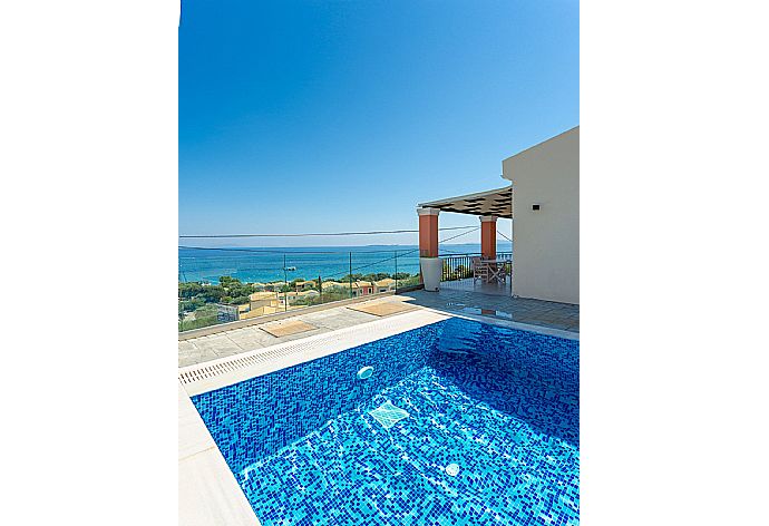 Private pool and terrace with panoramic sea views . - Akti Barbati Villa Tria . (Photo Gallery) }}