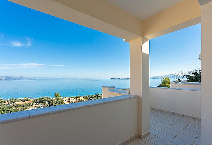 Upper terrace area with panoramic sea views . - Akti Barbati Villa Ena . (Photo Gallery) }}