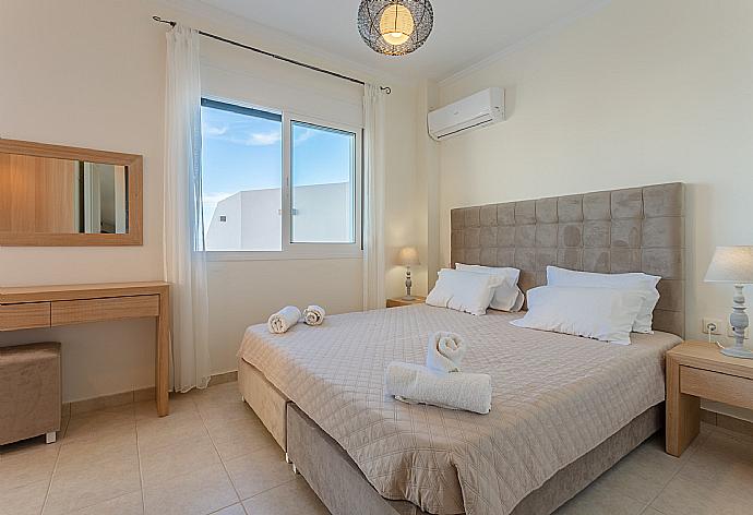Double bedroom with A/C and terrace access . - Akti Barbati Villa Ena . (Galleria fotografica) }}