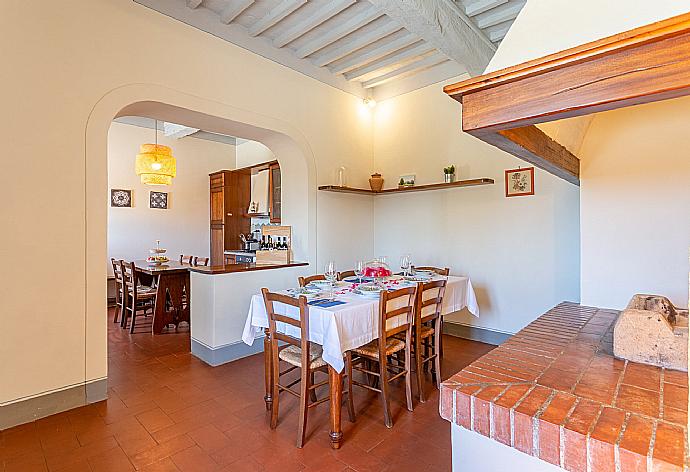 Dining room with kitchen, ornamental fireplace, WiFi internet, satellite TV, and terrace access . - Villa Le Balze . (Galerie de photos) }}