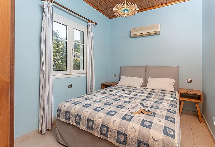 Double bedroom with A/C and TV . - Limani . (Photo Gallery) }}