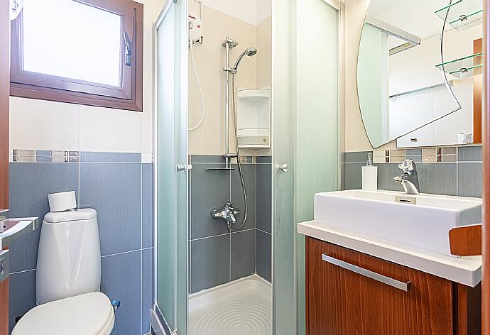 En suite bathroom with shower . - Villa Kalizoni . (Photo Gallery) }}