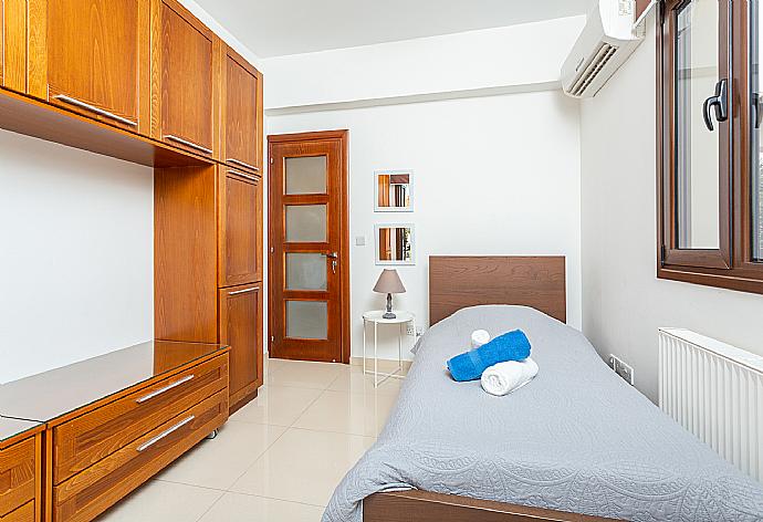 Single bedroom with A/C . - Villa Kalizoni . (Photo Gallery) }}