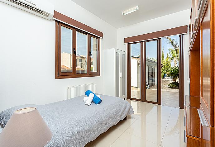 Single bedroom with A/C . - Villa Kalizoni . (Photo Gallery) }}