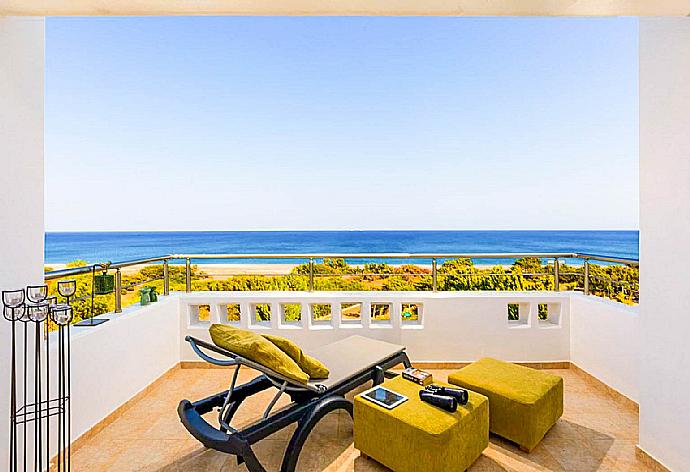 Balcony with sunbed and panoramic sea views . - Villa Mediterranean Blue . (Photo Gallery) }}