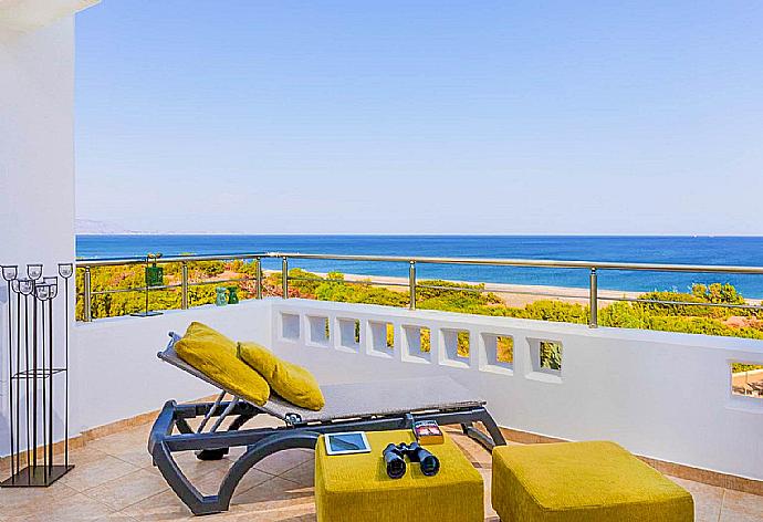 Balcony with sunbed and panoramic sea views . - Villa Mediterranean Blue . (Photo Gallery) }}