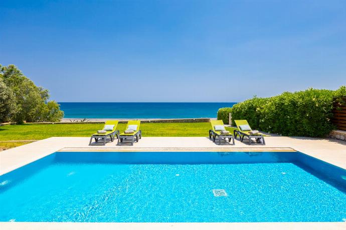 Private pool, terrace, and garden with sea views . - Villa Lahania . (Photo Gallery) }}