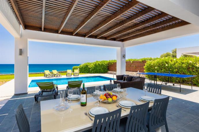 Sheltered terrace area . - Villa Lahania . (Photo Gallery) }}