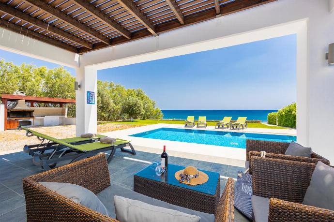 Sheltered terrace area . - Villa Lahania . (Photo Gallery) }}