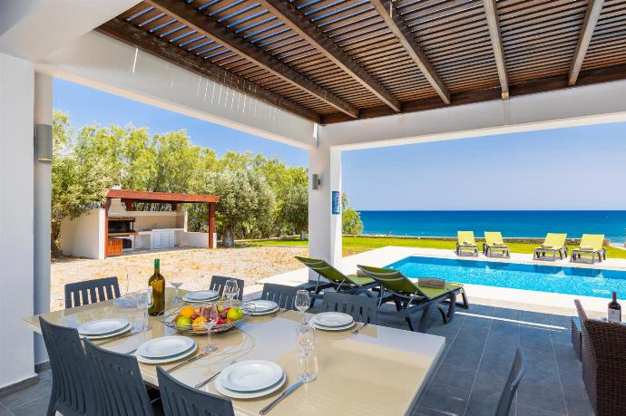 Sheltered terrace area with sea views . - Villa Lahania . (Photo Gallery) }}