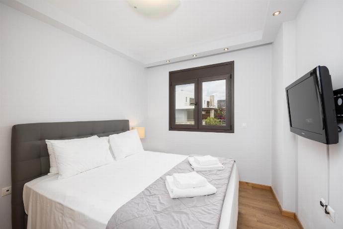 Double bedroom with A/C and TV . - Villa Lahania . (Photo Gallery) }}