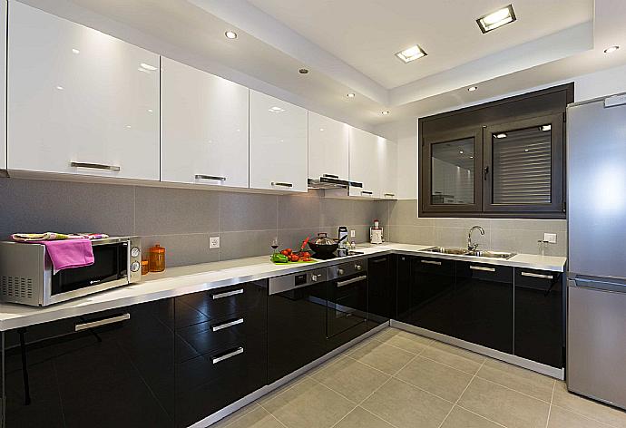 Equipped kitchen . - Villa Metis . (Photo Gallery) }}
