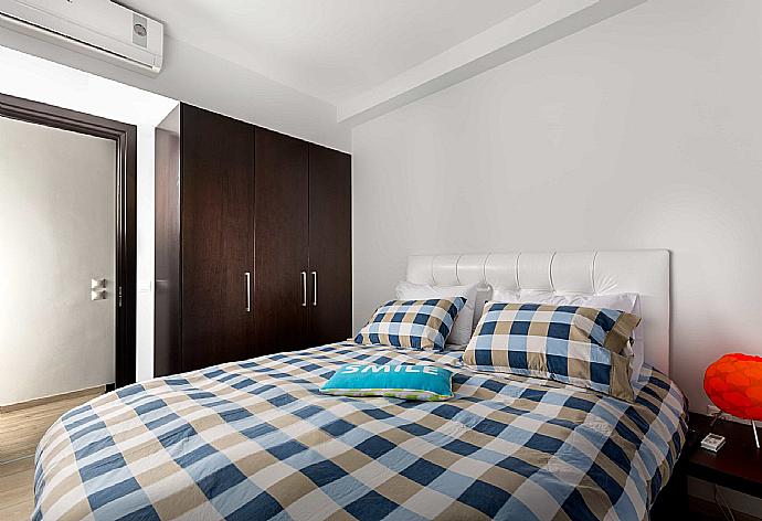 Double bedroom with A/C . - Villa Metis . (Photo Gallery) }}