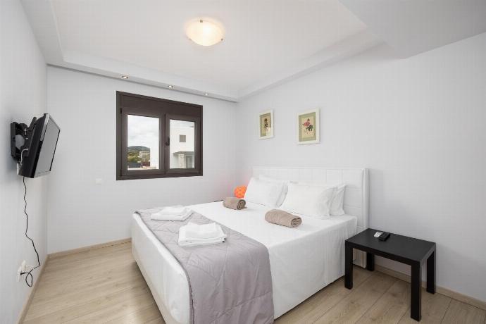 Double bedroom with A/C and TV . - Villa Metis . (Photo Gallery) }}