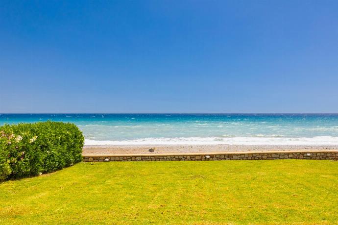 Garden area with panoramic sea views . - Villa Metis . (Photo Gallery) }}