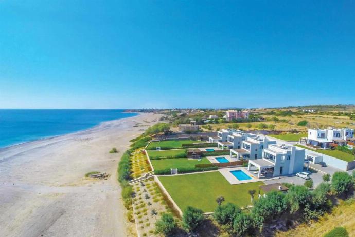 Aerial view showing the stunning location of of Villa Tsampikos . - Villa Tsampikos . (Photo Gallery) }}