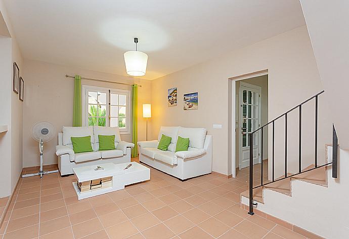 Living room with sofas, WiFi internet, satellite TV, and DVD player . - Villa Sa Lluna . (Galerie de photos) }}