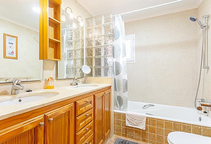 Family bathroom with bath and shower . - Villa Maria . (Photo Gallery) }}