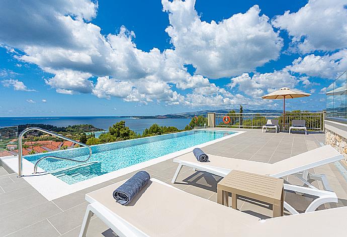 Private infinity pool and terrace with panoramic sea views . - Villa Lassi Fos . (Photo Gallery) }}